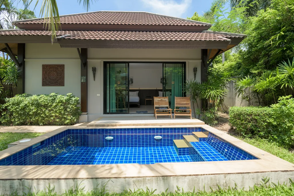 Private pool and garden of a one-bedroom villa in Nai Harn
