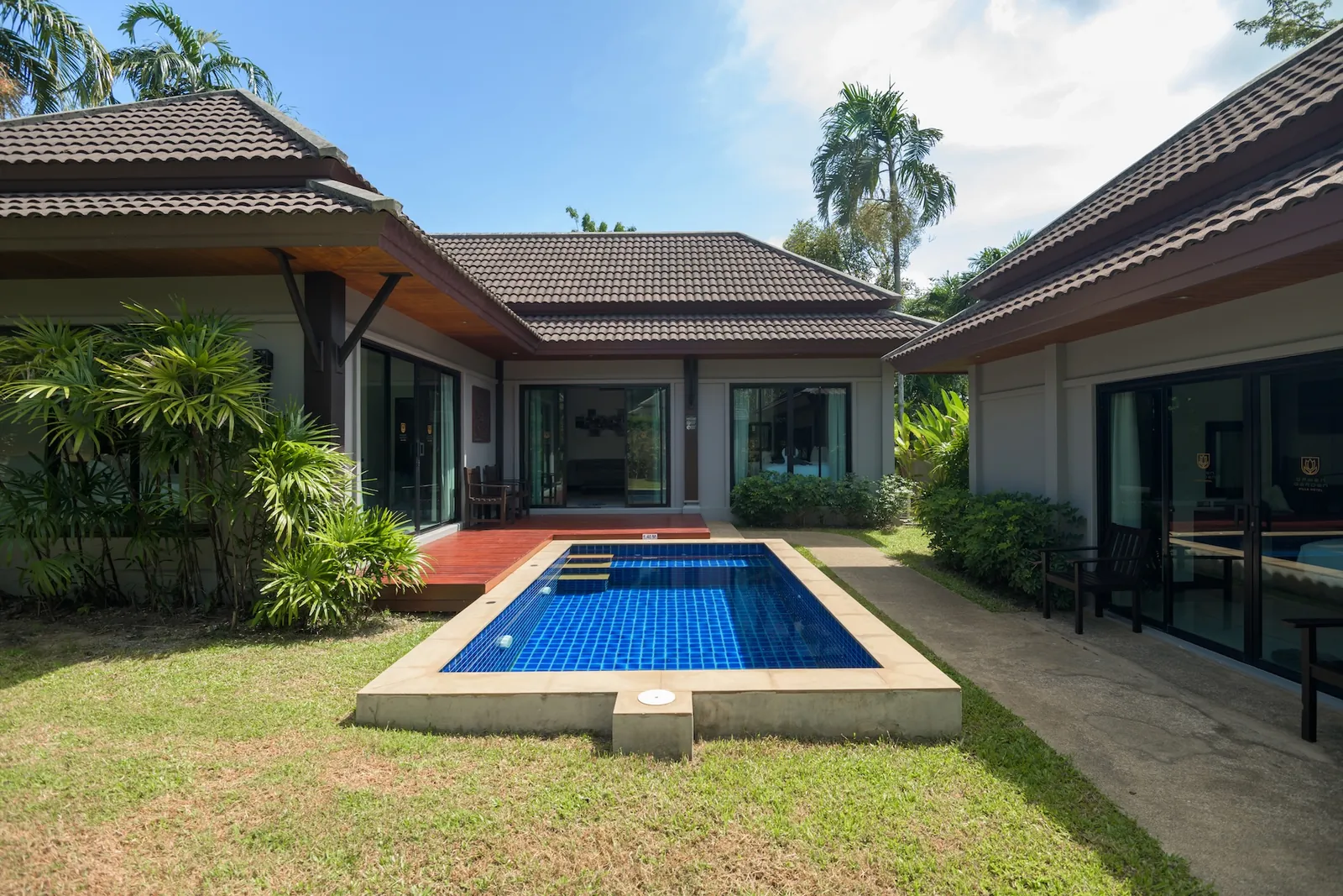 Tropical garden of a three-bedroom villa in Nai Harn